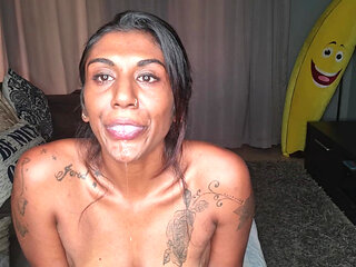 Desi Sits on the Couch Drooling as She Sticks Out and Wiggles Her Tongue Around