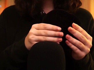 Brunette taps pumpkin in ASMR delight
