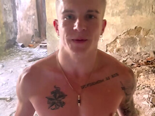 A gullible twink services a big-dicked man in an abandoned building and gets a big load of cum on his face.