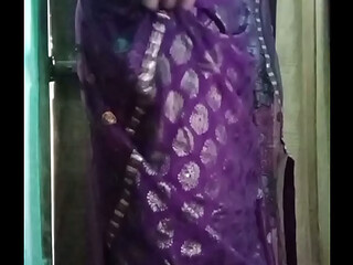 Indian Gay Crossdresser Bottom Gaurisissy showing her big boobs in purple saree