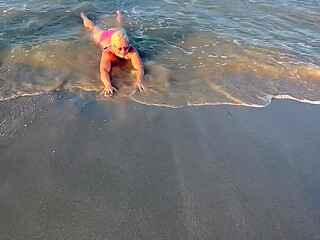 Try Not to Wet My Hair While Play with the Waves