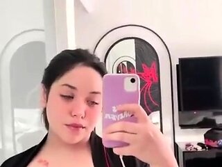 Busty curly brunette with big boobs fucks on couch