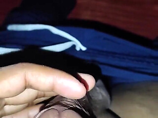 Masturbating
