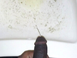 Big Black Cock PISSING