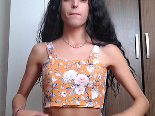 Petite shemale shows her feet and sucks on deodorant