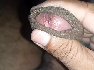 An Indian guy playing with his big cock