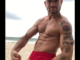 FLEXING AT THE BEACH