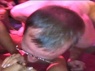 Mature Brunette Stretched Wide in Intense Group Fisting Session