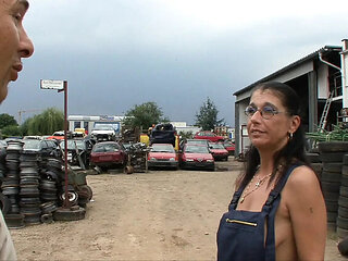 German amateur slut gets fucked hard on tires at work outdoor