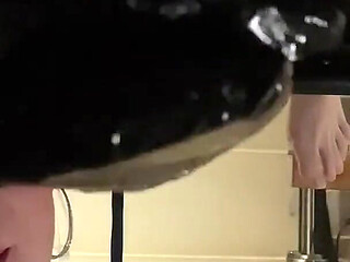 Close up Ruined Multiple Times Into a Glass on the Milking Table