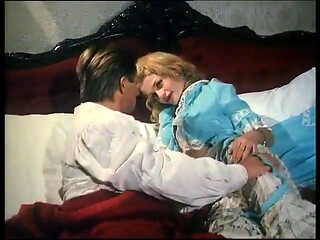 Vintage porn: Cristoph Clark takes care of a hot blonde in his bed