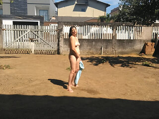 My wife drop the towel outside and pissing naked