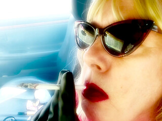 MATURE BLONDE SMOKING VS120 MENTHOLS WITH CAT SUNGLASSES