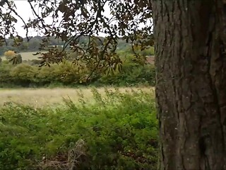 Hot British MILF gives a sloppy blowjob in the forest
