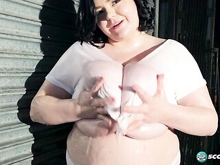 BBW brunette Peyton Thomas plays with her gigantic tits on cam