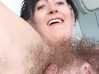Extremely Hairy Brunette Ginnagg Put a Small Vibrator on Her Clit and Got a Small Orgasm Laughing.