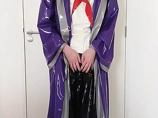 Putting on latex saint priest robe coat over schoolgirl sailor uniform and long rubber skirt