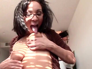 Sexy babe in glasses gives head to this dude with the long dong