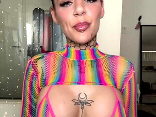 Inked Hottie with Buns Teases in Shiny Rainbow Mesh Top