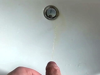 Boy is Pissing in the Sink and makes stinky farts