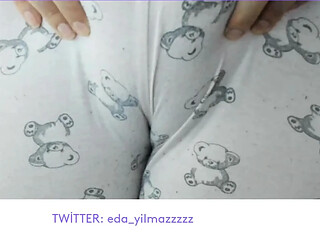 German MILF plays with her big natural tits in pajamas