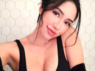 Busty babe playing with her big boobs