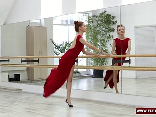 Petite Russian gymnist Zadornaya in red dress demonstrates flexibility and