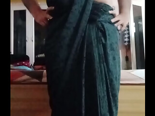 Indian Gay Crossdresser Gaurisissy feeling horny in black saree showing her big boobs