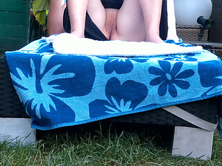 Outdoors on a Lounge Chair