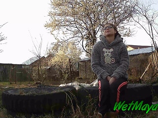 Peeing on some old tires in the yard