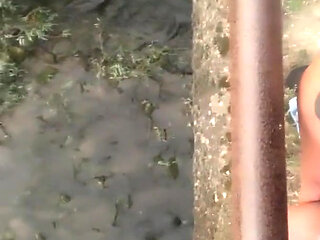 Twink Piss From the Bridge Into the River