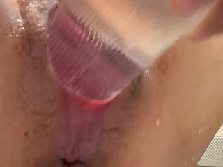 Self-fist insertion into her and a 6cm plastic bottle