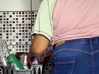 Curvy Girl Farting in Jeans While Doing the Dishes