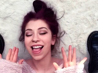 Petite redhead enjoys foot fetish session