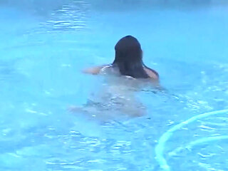 Hot Young Shemale Gets a Naked Swim in the Pool