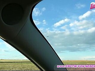 German female hitchhiker sucks the taxi driver's penis in the car