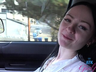 Beautiful woman with glasses has rough sex in a car