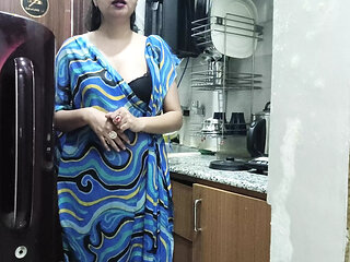 Indian stepmom watches and enters her stepson's Kitchen to fuck him.
