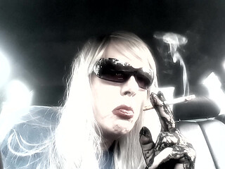Mrs. Ruthie Dommie Mommy smoking Marlboro 100s in her car