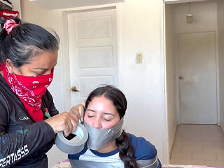 Fantasizing 18-year-old Taped & Gagged by Masked MILF
