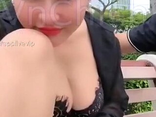 Vietnamese GF shows off her juicy tits in a public show
