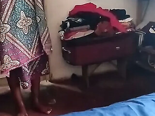 African model rehearses forbidden moves at home