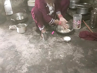 Stepsister gives a wet handjob in the kitchen