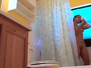 Stepdaughter 21 shaves pussy in shower (voyeur)