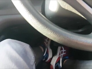 Milf gives a POV blowjob in the car park