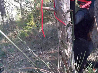 Outdoor sex in the wood. Wearing sexy clothes and high heels, bound, throated and fucked