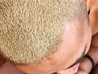 A Ginger Bear Plays with a Skinny Latino