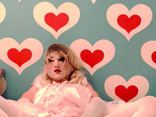 Sissy in pink frilly lingerie