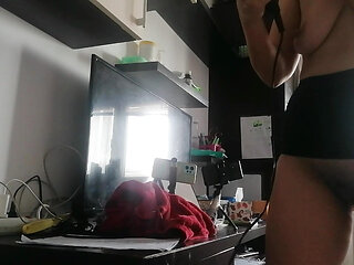 Amateur wife dries her hair.