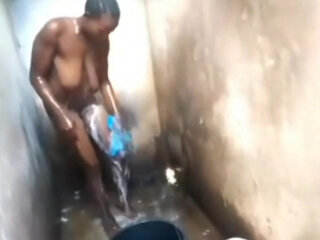 The African shower with the African woman